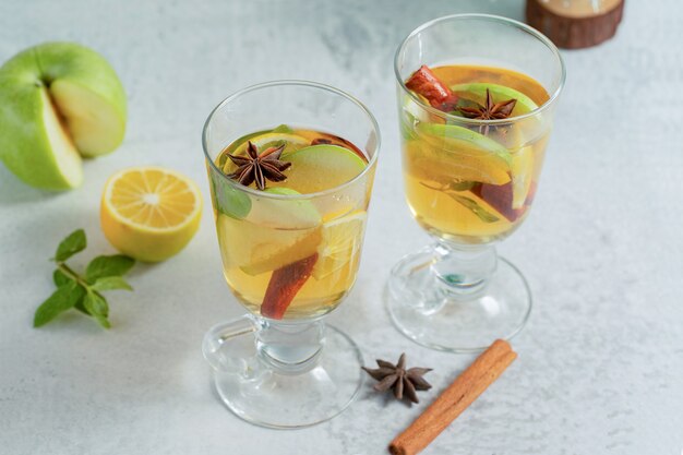 Homemade apple cocktail. on grey surface. 