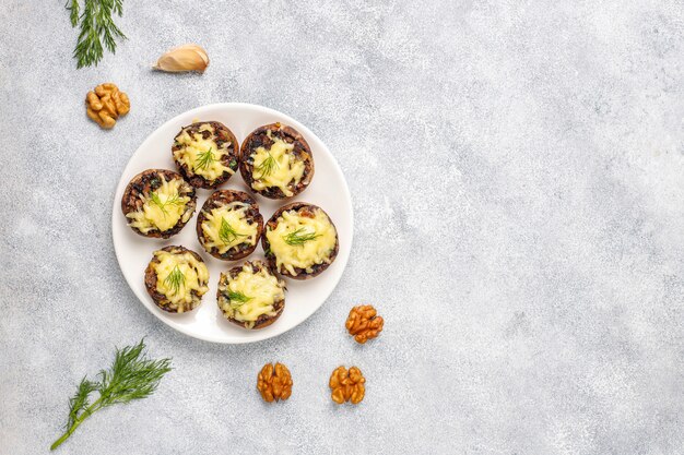 Homemade baked stuffed champignon mushrooms with fresh dill and Cheese