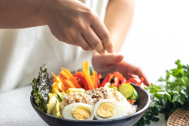 Free Photo homemade bowl with rice vegetables and eggs