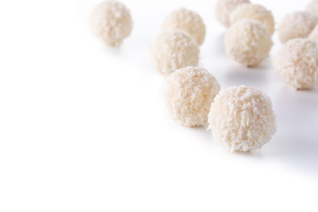 Homemade coconut balls isolated on white background