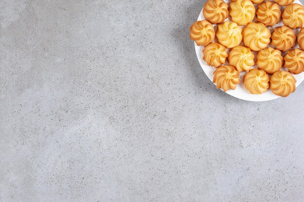 Homemade cookies on a plate on marble background. High quality photo