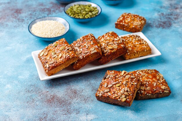 Homemade crispbread cookies with sesame,oatmeal,pumpkin and sunflower seeds.Healthy snack, seed crackers