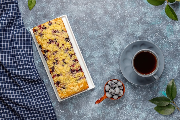 Homemade delicious blueberry crumble cake with frozen blueberries,top view