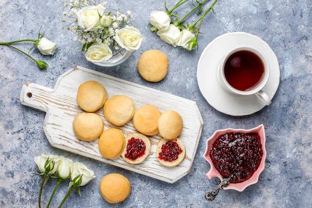 Homemade delicious cookies serving with raspberry jam,top view