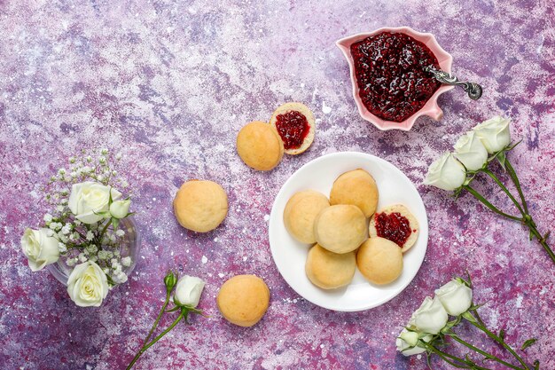 Homemade delicious cookies serving with raspberry jam,top view