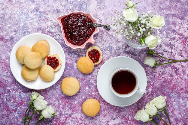 Homemade delicious cookies serving with raspberry jam,top view