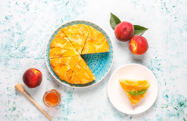 Homemade delicious french dessert tart tatin with peaches.