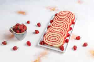 Free photo homemade delicious raspberry cake roll.