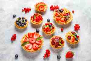 Free photo homemade delicious rustic summer berry tartles.