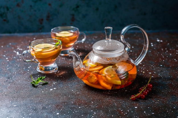 Homemade fruit and berry tea with mint.