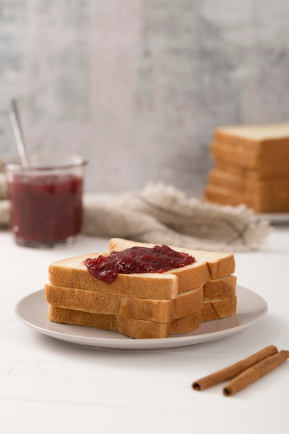 Homemade fruit butter and slices of toast