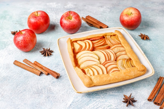 Free photo homemade galette with apples and cinnamon.