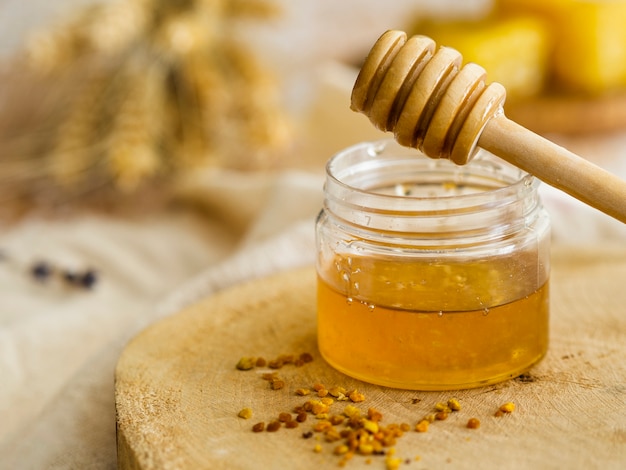 Homemade honey in jar front view