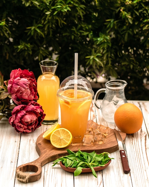 Homemade ice tea filled with lemon slices