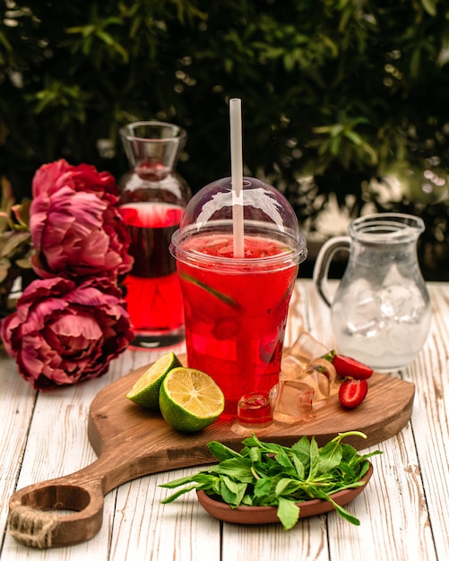 Homemade ice tea filled with slices of lime