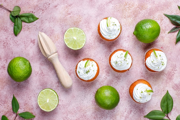 Homemade Key lime cupcakes with whipped cream and lime zest