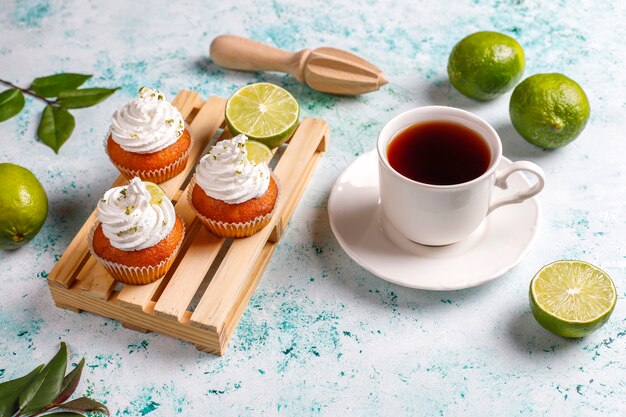 Homemade Key lime cupcakes with whipped cream and lime zest