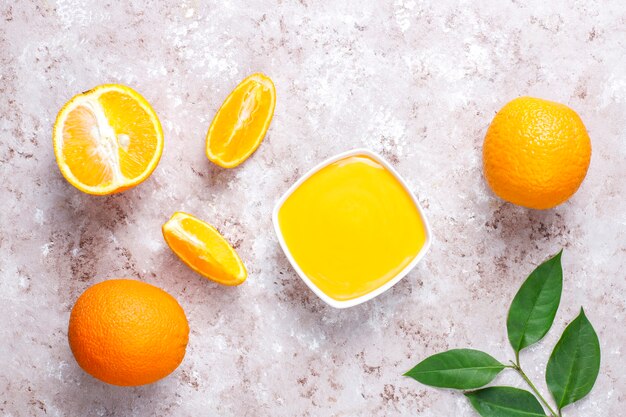 Homemade orange curd with juicy oranges