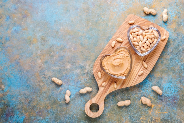 Homemade organic peanut butter with peanuts