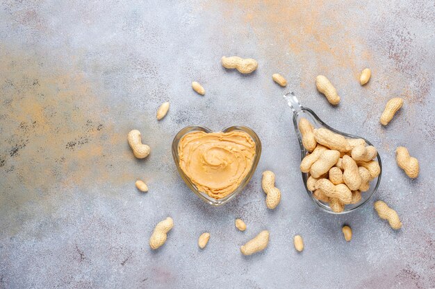 Homemade organic peanut butter with peanuts.