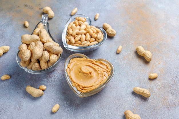 Homemade organic peanut butter with peanuts.