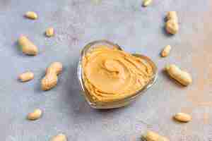 Free photo homemade organic peanut butter with peanuts.