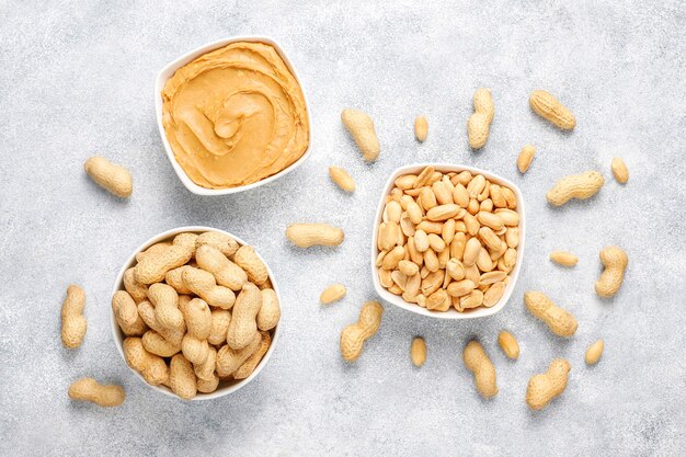 Homemade organic peanut butter with peanuts.