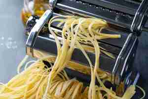 Free photo homemade pasta on dark background