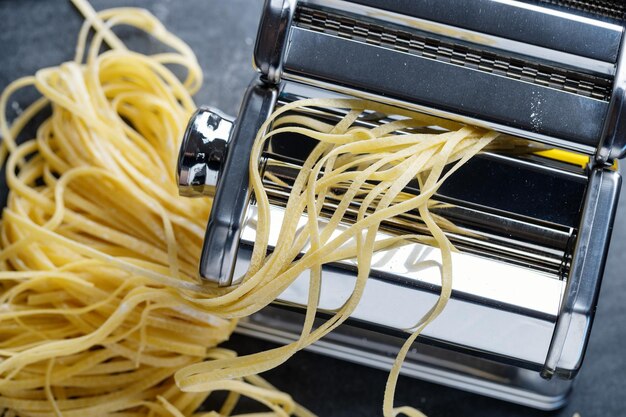 Homemade pasta on dark background