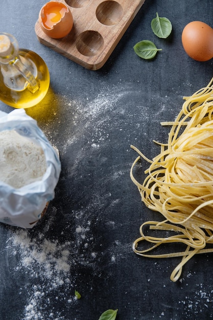 Homemade pasta on dark background