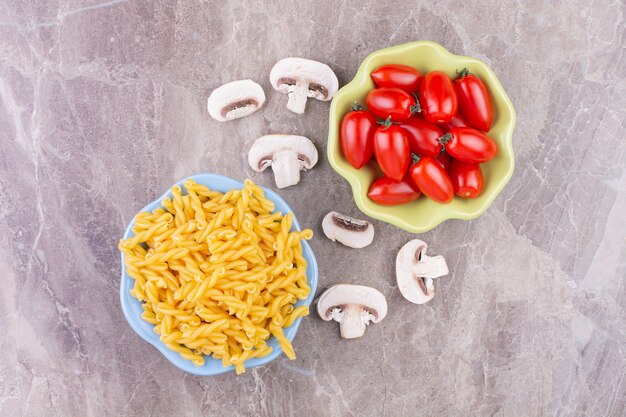 Homemade pastas with red cherry tomatoes