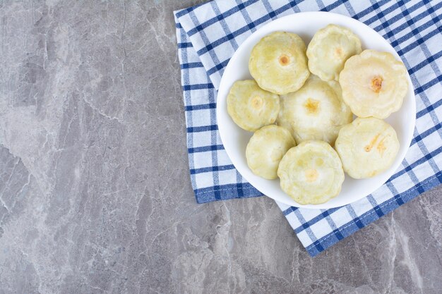 Homemade pickled vegetables in white bowl.