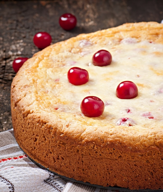 Free photo homemade pie with cherries and cream