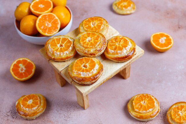 Homemade puff pastry with tangerine slices.