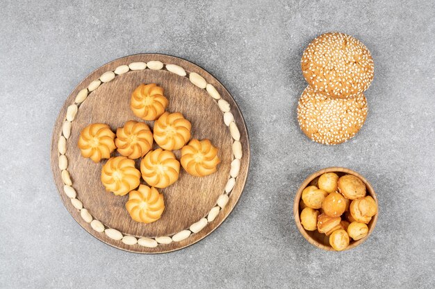 Homemade sweet biscuits on marble surface