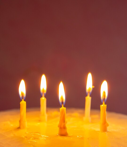 Homemade sweet cake for anniversary with candles