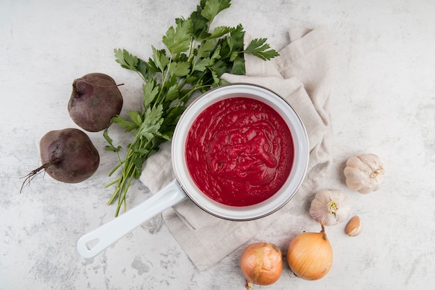 Free photo homemade tomato cream soup in kettle