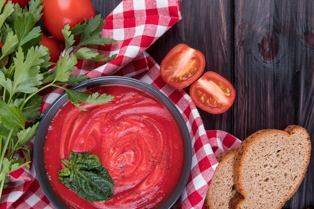 Homemade tomato cream soup and slices of bread