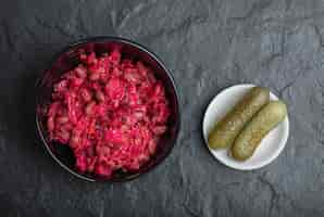 Free photo homemade vinaigrette with beans in bowl and pickle. top view .