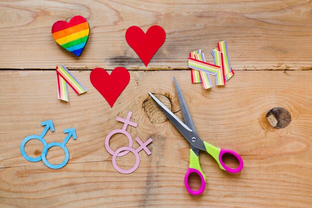 Homosexual couples icons with hearts and rainbows