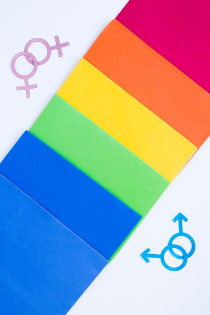 Homosexual couples icons with rainbow of papers