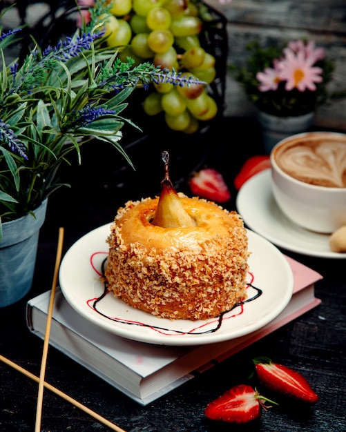 Free photo honey cake with pear on the table