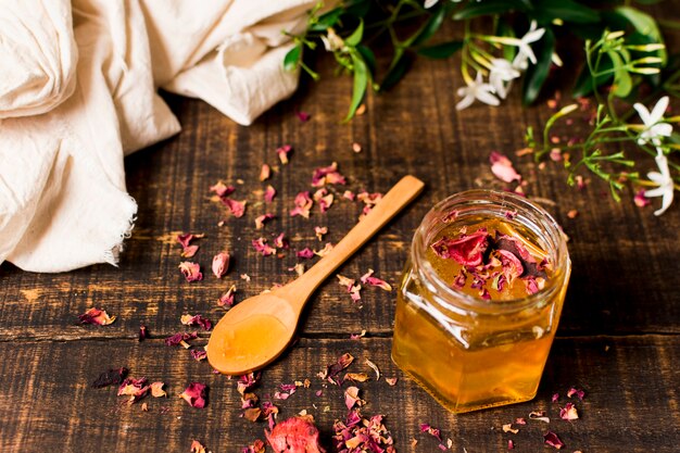 Honey jar with petals