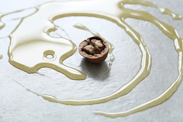 Honey on the table with walnut