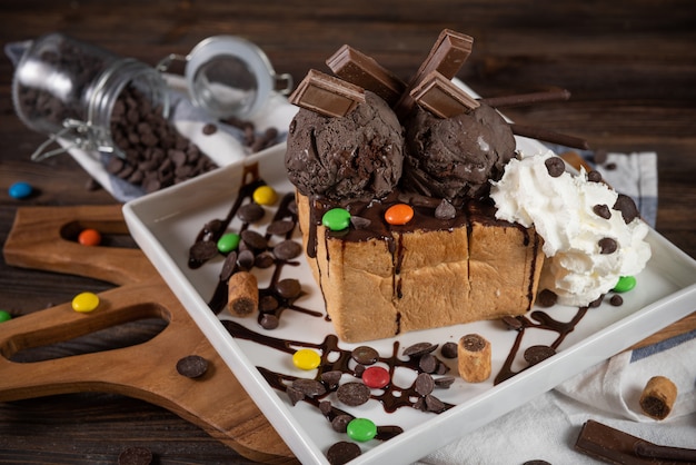 Honey toast with chocolate ice cream and whipped cream