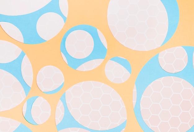 Free photo honeycomb pattern on circle shape over the yellow background