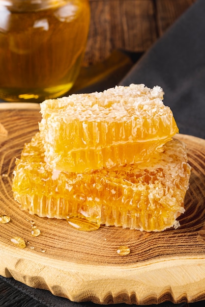 Honeycombs on wooden platter