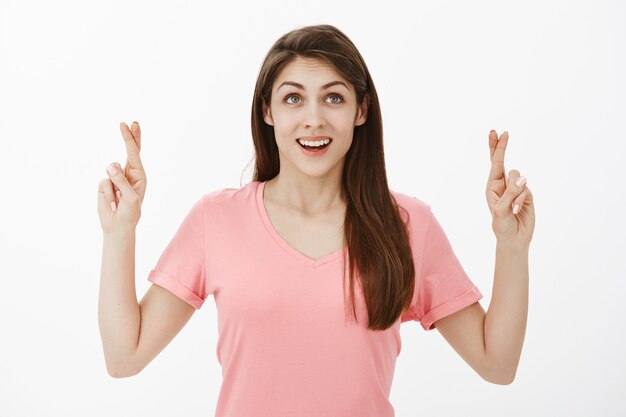 hopeful brunette woman posing in the studio