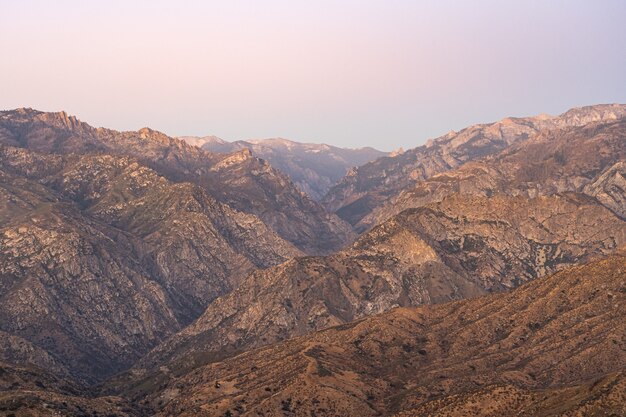 Horizontal shot of brown mountain ranges