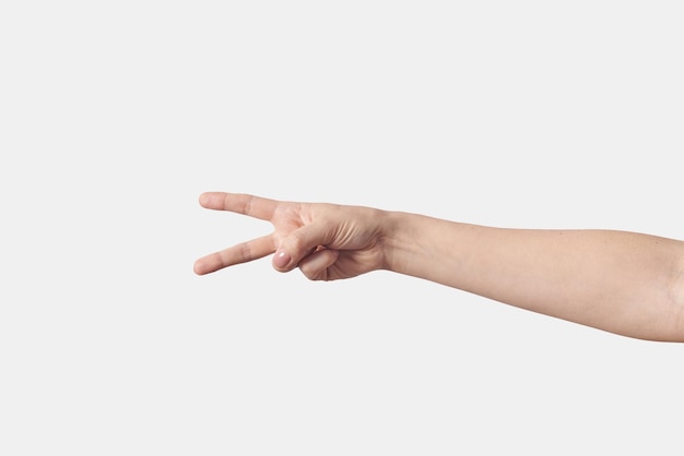 Horizontal victory gesturing female hand